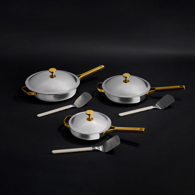 gold titanium large always pan pro, always pan pro, and mini always pan pro with stainless steel spatulas