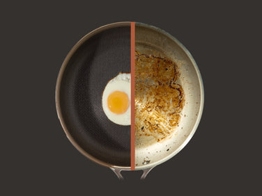 A frying pan divided down the middle; the left side is clean with a cooked egg, while the right side is dirty with grease and food residue.