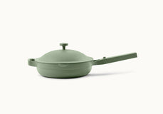 Matte green nonstick frying pan with a lid and long handle, displayed on a plain white background.
