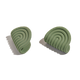 Two sage green, curved, ridged silicone objects of different sizes are placed on a plain white background.