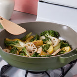 Sautéing vegetables in a green Large Always Pan