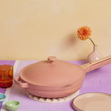 Serving a meal from a pink Large Always Pan