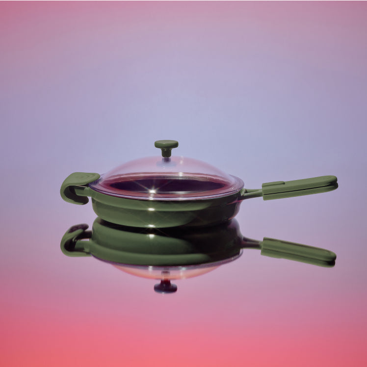 Green Cast Iron Always Pan on reflective background