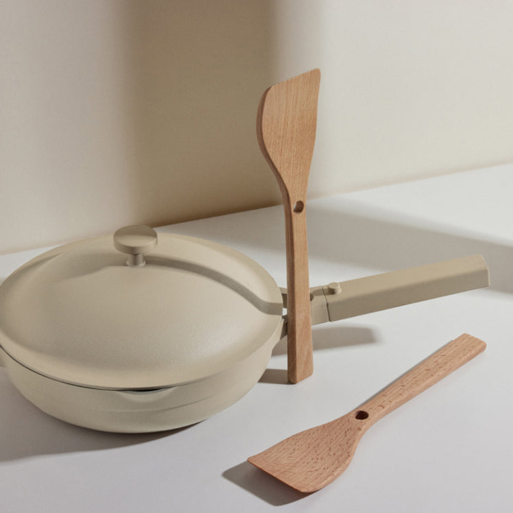 beige always pan with two beechwood spatulas