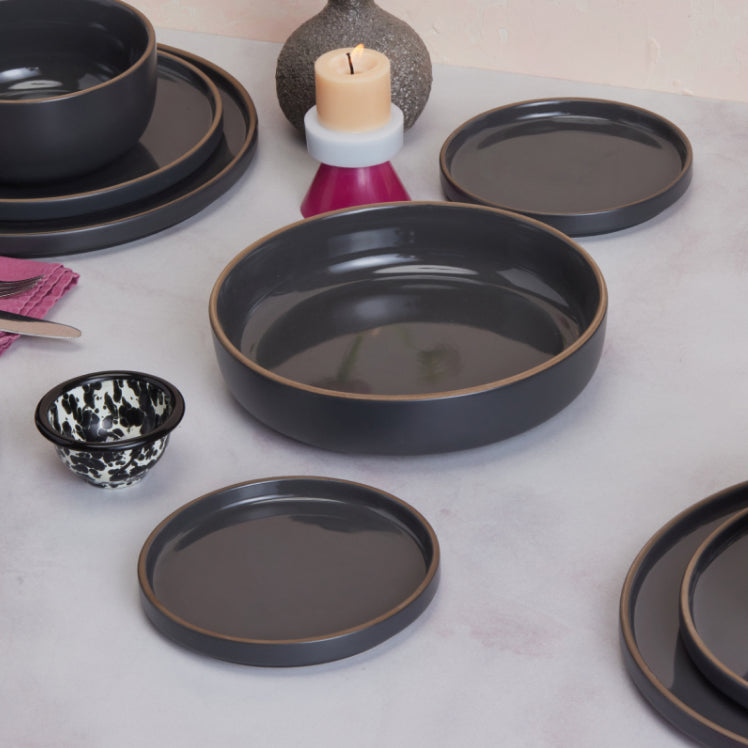 black dinnerware on a table