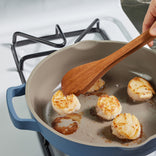 Blue Always Pan searing on stovetop