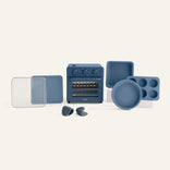 Collection of blue kitchen appliances and cookware on a white background