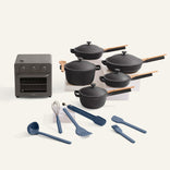 Set of black cookware with wooden handles and blue kitchen utensils on a white background