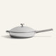 A silver stainless steel Titanium Always Pan Pro 30 cm 2.0 frying pan with a matching lid and a long handle.