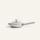 A small, polished stainless steel Titanium Always Pan Pro 20 cm 2.0 skillet with a matching lid and a long handle.