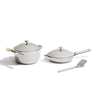Stainless steel cookware set with lids and wooden handles on a white background