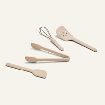 Mini Utensil Essentials: a set of four sturdy silicone tools—spatula, tongs, slotted turner, and whisk with beige handles—on a light background.