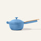 The Ceramic Nonstick Perfect Pot 2.5 L, featuring a light blue finish, matching lid, and wooden handle, is ideal for preparing sauces, soups, or grains and is shown against a plain off-white background.