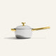 White Titanium Perfect Pot Pro 3 L cooking pot with a matching lid, featuring a gold-toned handle, side grip, and lid knob.