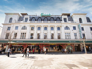 Fenwick store front on a city street with people walking by