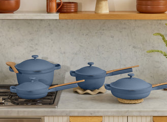 blue perfect pot, mini always pan, mini perfect pot and always pan on counter and stove