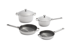 A four-piece stainless steel cookware set including two lidded pots and two frying pans.
