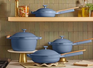 blue ceramic nonstick cookware set on counter