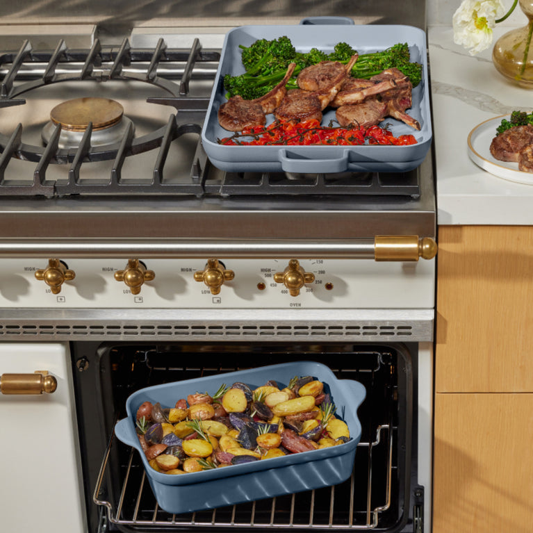 blue griddle pan on stove, blue main bake in oven