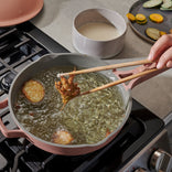 pink-always-pan-frying-on-stovetop