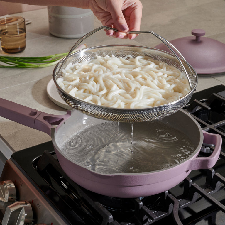 purple-always-pan-on-stovetop-with-noodles